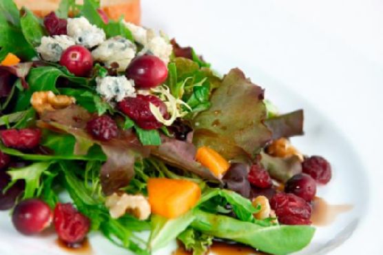 Green Salad with Pomegranate Vinaigrette and Goat Cheese Garnish Green Salad with Pomegranate Vinaigrette and Goat Cheese Garnish