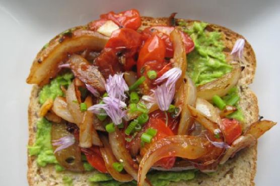 Avocado Toast With Caramelized Sweet Onion, Grape Tomatoes, Fresh Garden Chives and Chive Blossoms