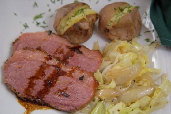 Baked Corned Beef with Sauteed Cabbage and Baked New Potatoes Baked Corned Beef with Sauteed Cabbage and Baked New Potatoes