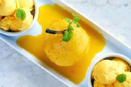 Classy Poached Pear In Spicy Mango Nectar With Mango Ice Cream Classy Poached Pear In Spicy Mango Nectar With Mango Ice Cream