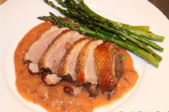 Duck with Dried Cranberries, Tangerines and Mascarpone Sauce