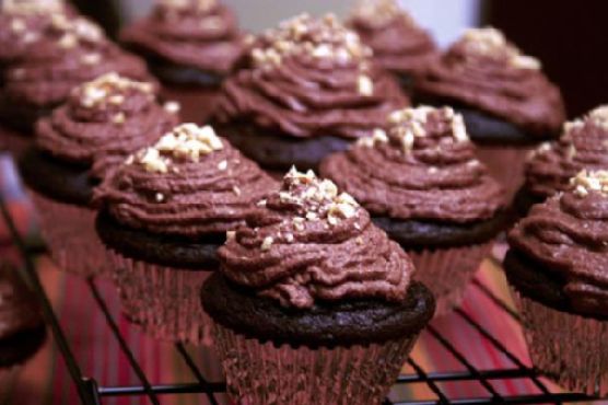 Peanut Butter Filled Chocolate Cupcakes with Chocolate Ganache Frosting Peanut Butter Filled Chocolate Cupcakes with Chocolate Ganache Frosting