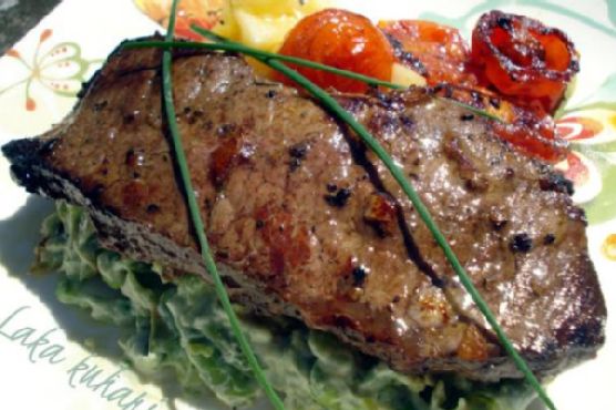 Strip steak with roasted cherry tomatoes and vegetable mash Strip steak with roasted cherry tomatoes and vegetable mash