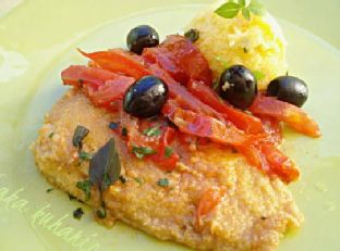Cod with tomatoes, olives and polenta