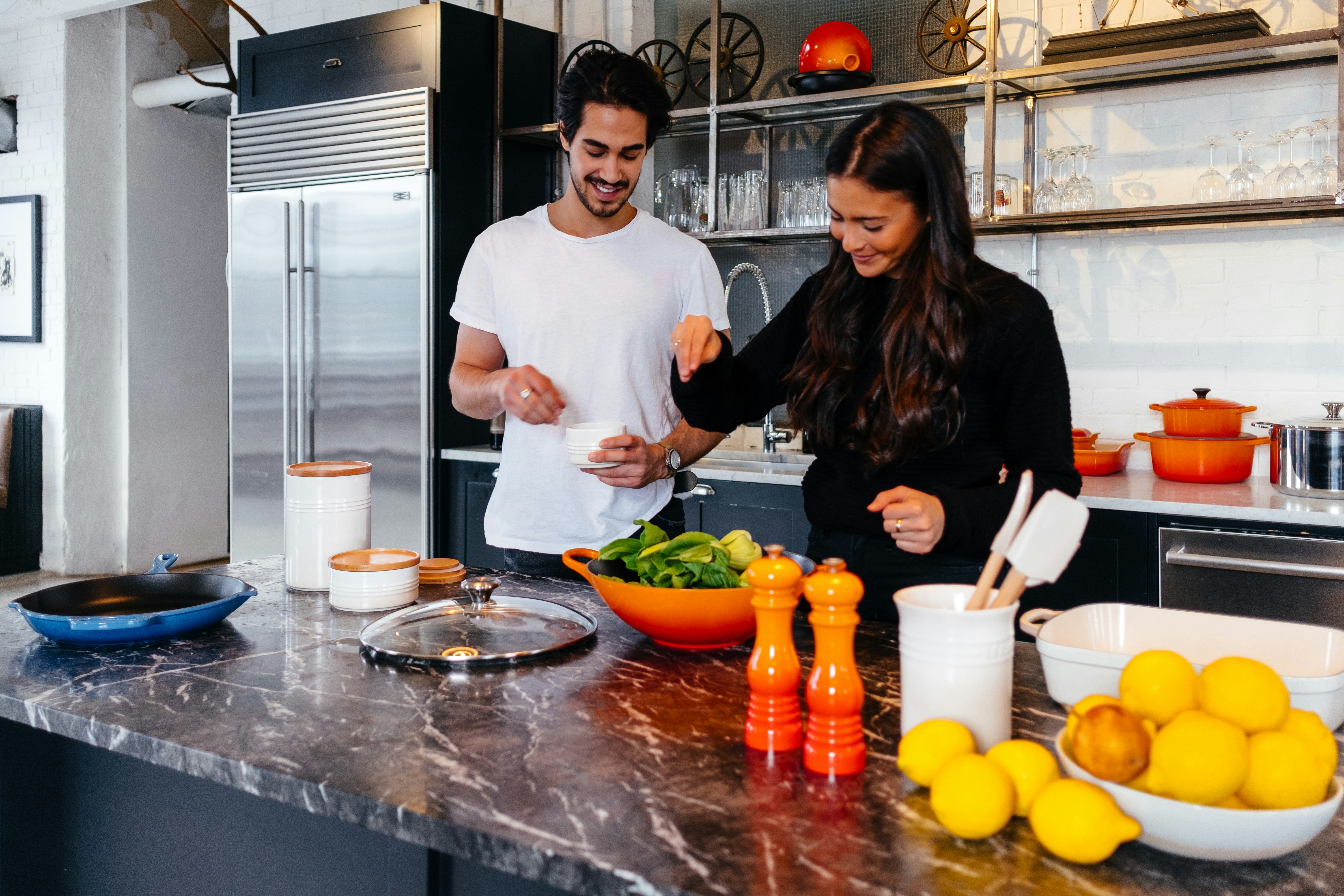 Happy couple cooking